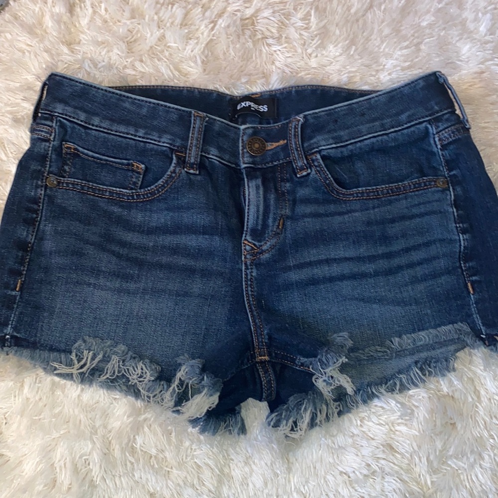 Low rise frayed denim shorts from Express.